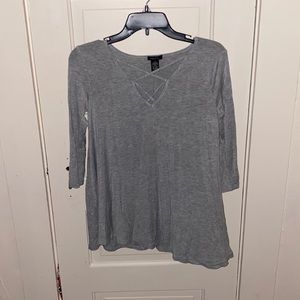 Grey and soft, chest is front crossed